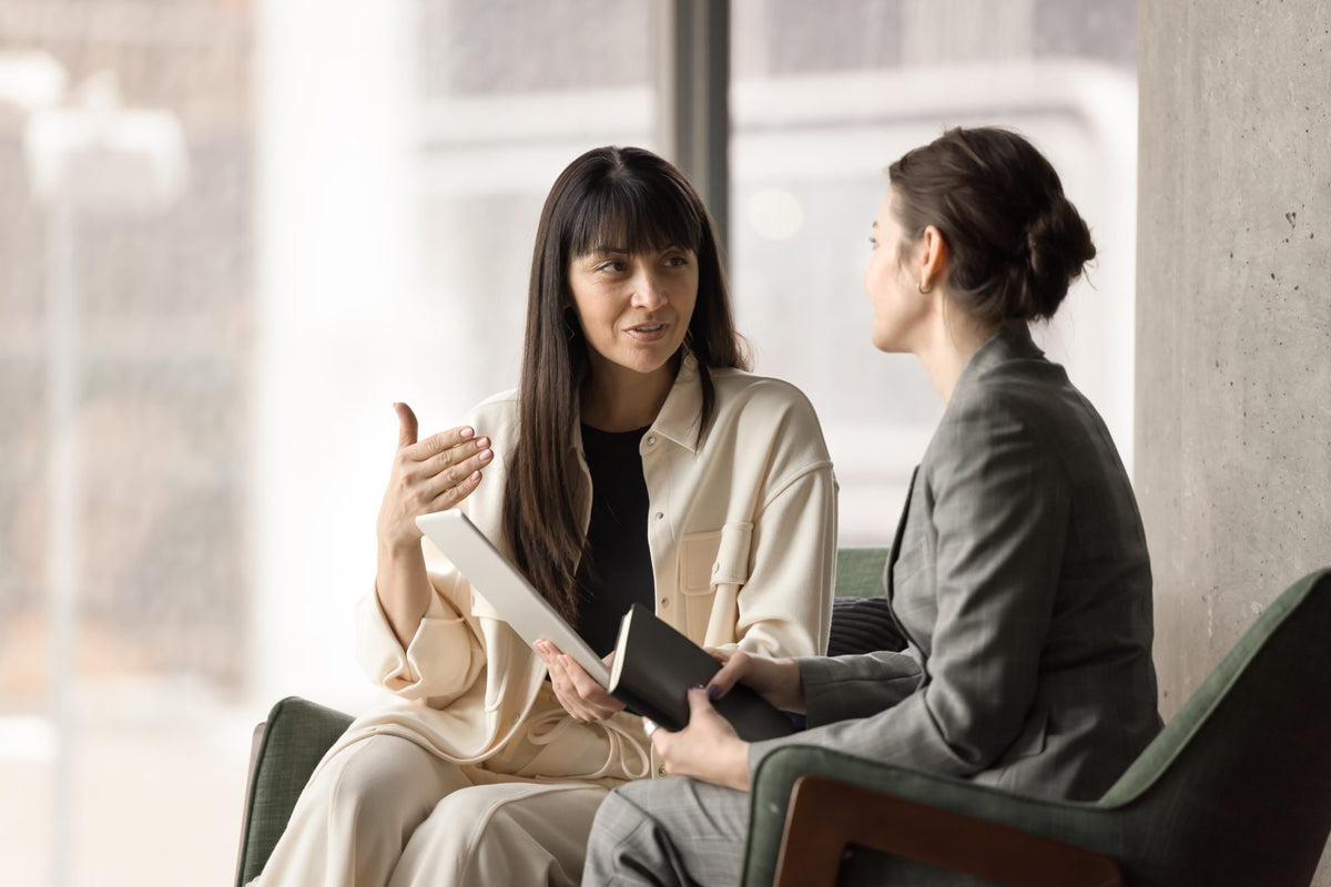 A Lewis Medix coordinator talks with a client